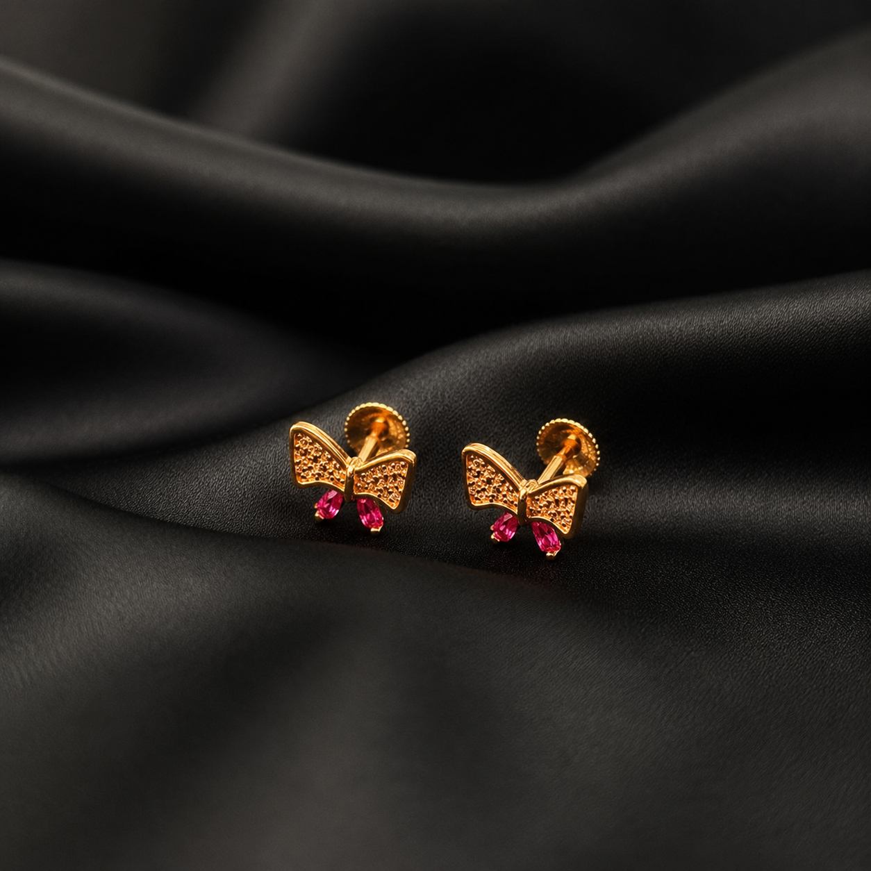 Ruby Bow Sparkle Gold Plated Silver Earrings