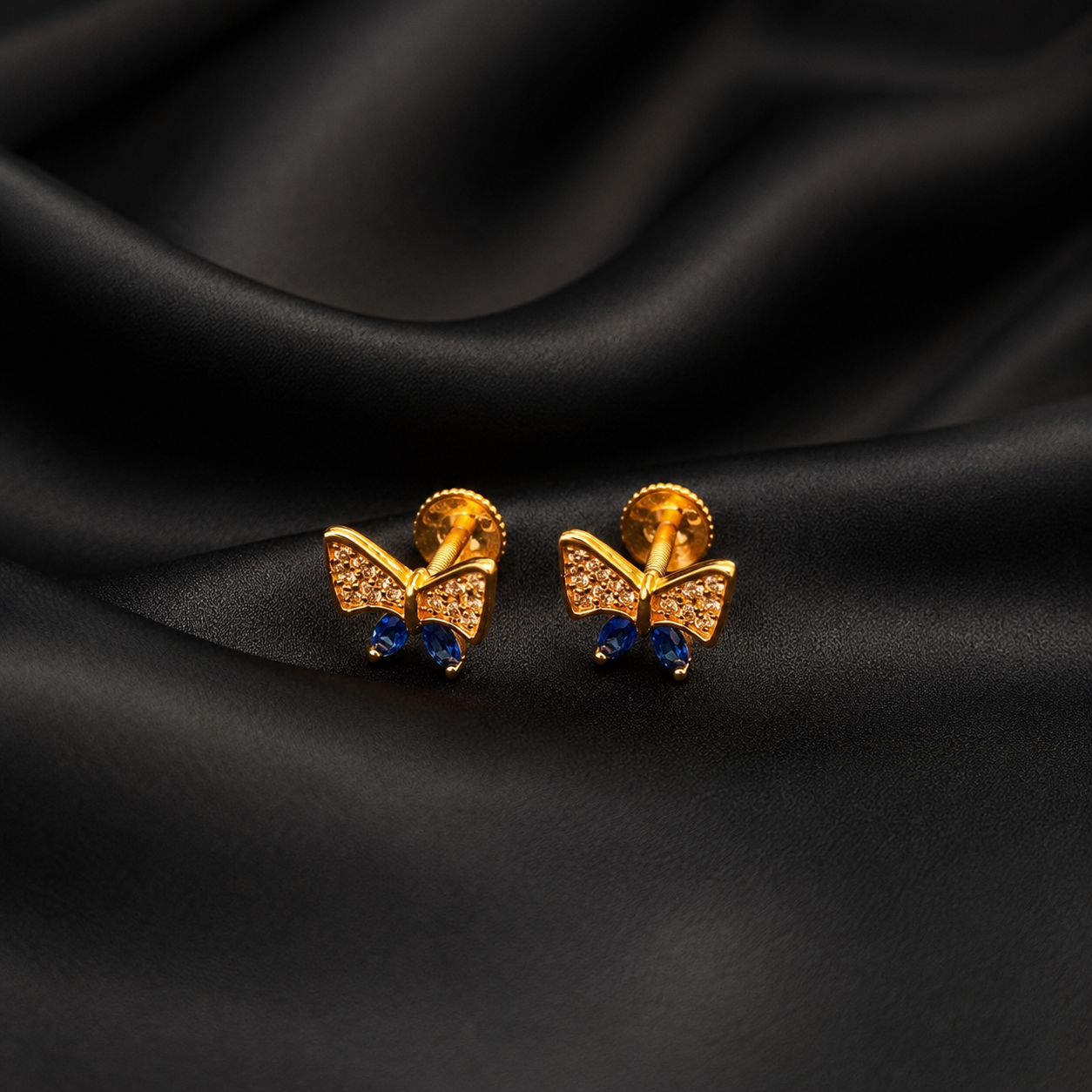 Sapphire Bow Sparkle Gold Plated Silver Earrings